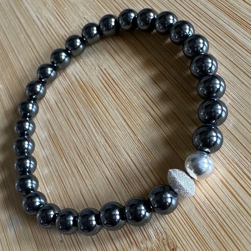 Polished 6mm Polished Jet Hematite Stretch Bracelet w/ Sterling Silver Spacers